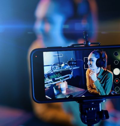 Young woman streaming a live video Young woman streaming a live video